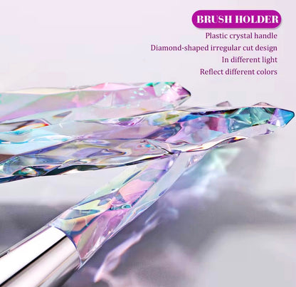 10-piece vegan makeup brush set with iridescent, crystal-style handles, contained in a clear, holographic carrying case.